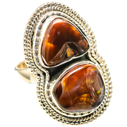 Silver teardrop agate ring with two stacked amber stones in scalloped rope bezel