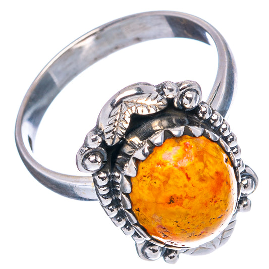 Oval orange gemstone sterling silver ring, openwork side setting and bead accents