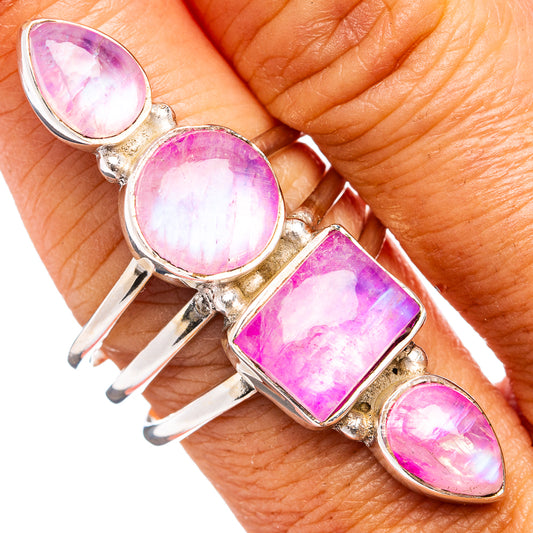 Sterling silver ring with pink oval moonstone cabochons and faceted side accents