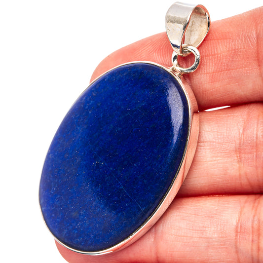 Oval lapis lazuli pendant with .925 sterling silver bezel and loop bail
