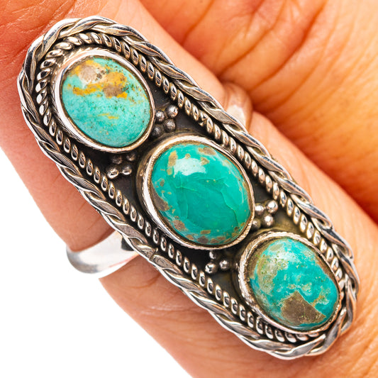 Turquoise oval three-stone sterling silver ring with rope-edged bezel
