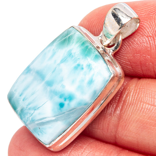 Sterling silver larimar pendant, rectangular light-blue stone with silver frame and bail.