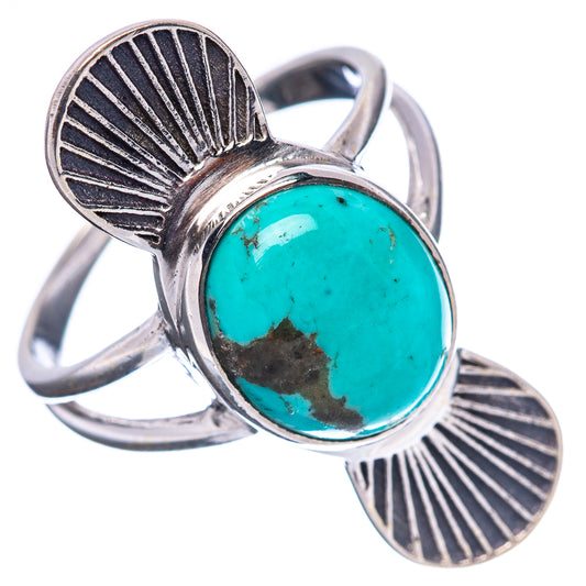 Sterling silver turquoise ring with oval stone, sunburst side accents, open band