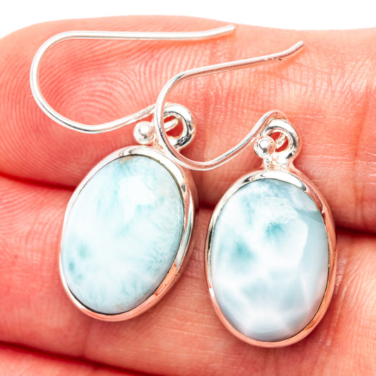 Sterling silver oval larimar drop earrings with blue-green stone on French hooks