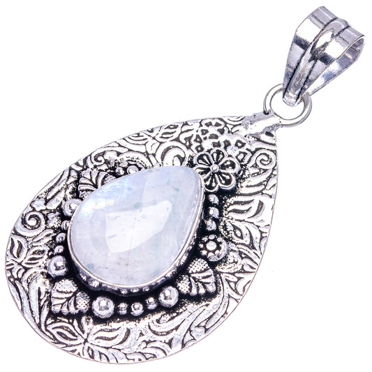 Ornate teardrop German silver pendant with moonstone cabochon and engraved floral details