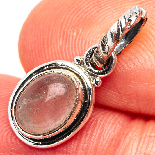Sterling silver rose quartz pendant with oval cabochon and chain link bail