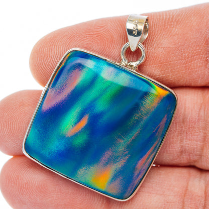 Rectangle opal pendant in blue-green iridescent tones with sterling silver frame