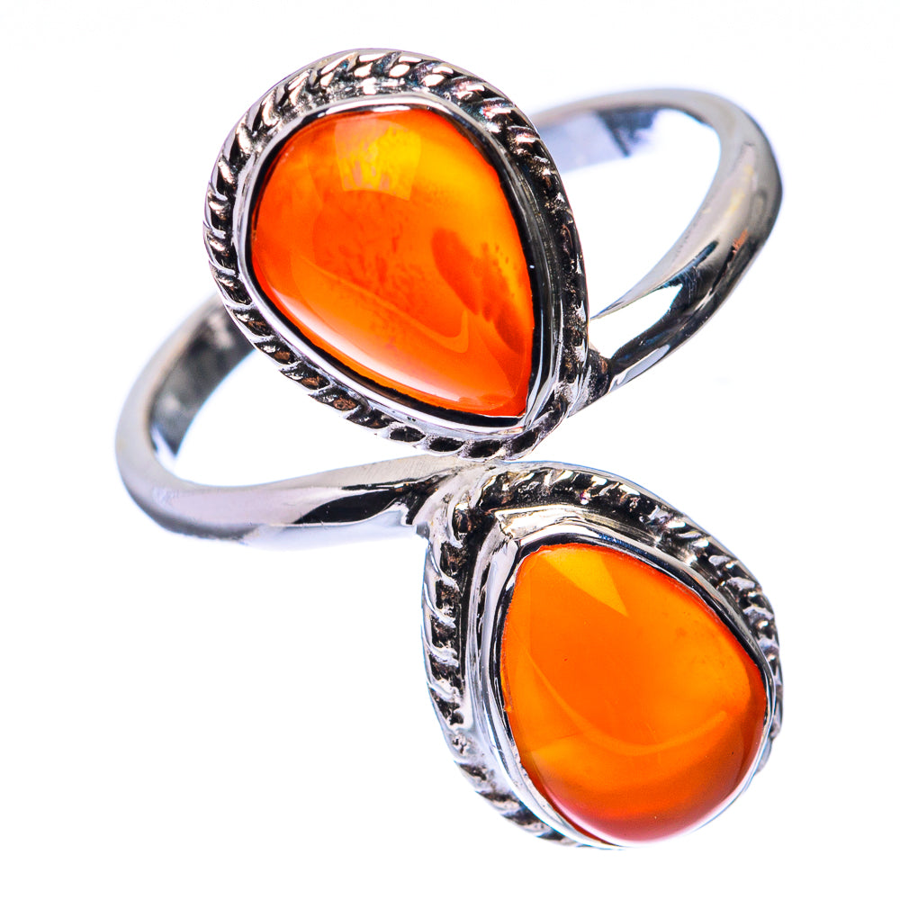 Silver-tone two-stone ring with oval orange carnelian cabochons in engraved bezel