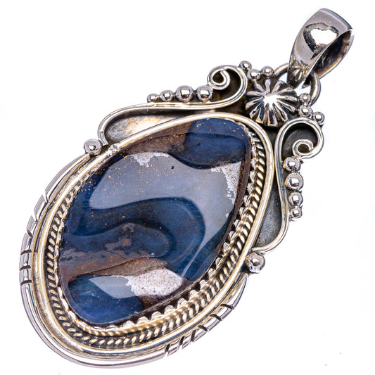 Sterling silver boulder opal pendant with oval blue stone, detailed side accents and bail