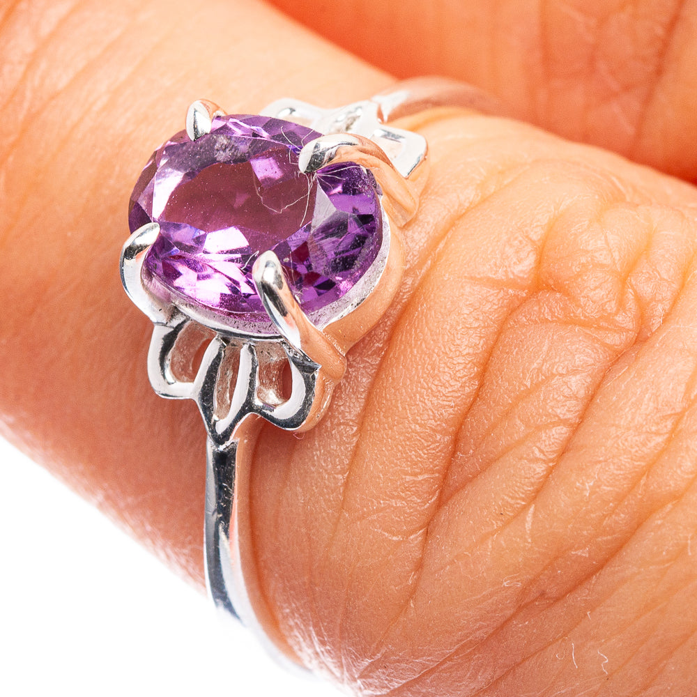 Sterling silver dainty ring with faceted oval amethyst gemstone and prong setting