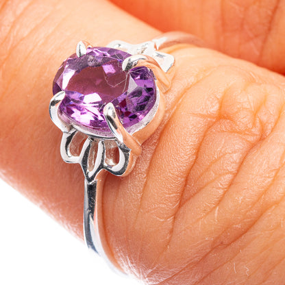 Sterling silver dainty ring with faceted oval amethyst gemstone and prong setting