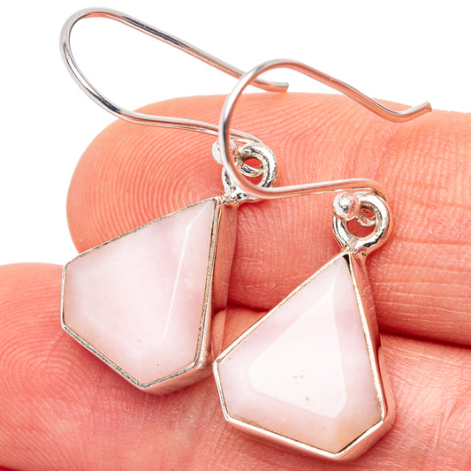 Pink opal drop earrings with .925 sterling silver frames and geometric pink stones
