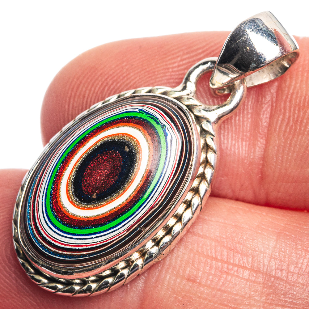 Oval sterling silver pendant with multicolor ring-pattern stone and loop bail