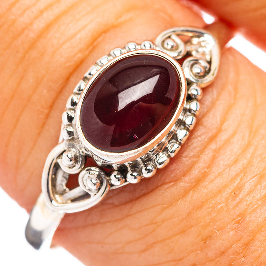 Oval garnet gemstone ring in .925 sterling silver, maroon cabochon with ornate bezel