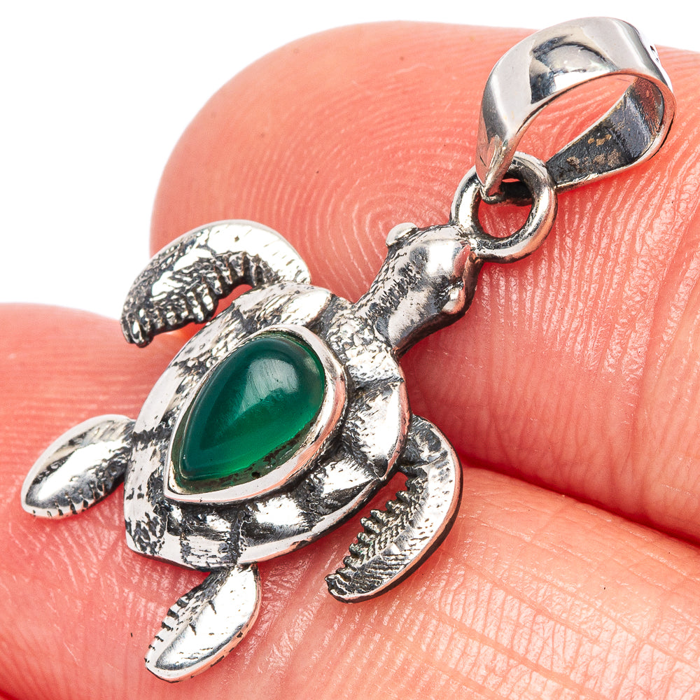 Sea turtle pendant with green oval gemstone in polished 925 sterling silver setting
