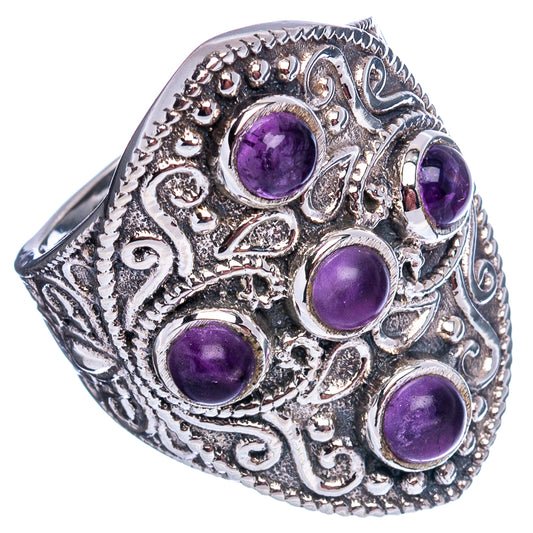 Sterling silver amethyst ring with five purple cabochon stones and engraved filigree face