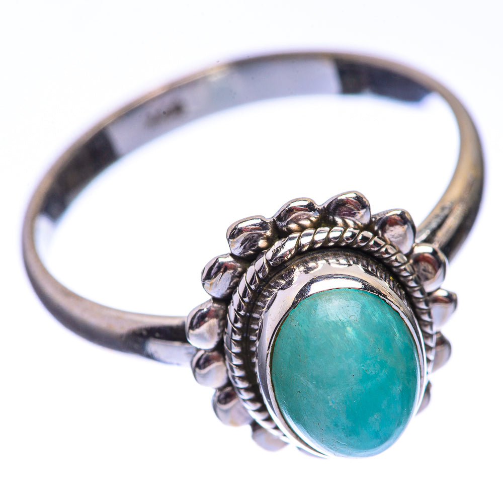 Sterling silver dainty ring with oval green cabochon, detailed beaded setting