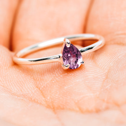 Sterling silver amethyst stackable ring with oval purple gem and three-prong setting