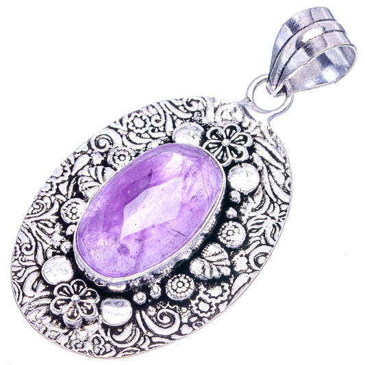 Hanging amethyst pendant with oval purple stone and floral silver border