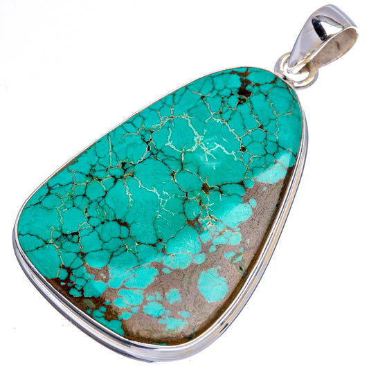 Turquoise teardrop pendant in .925 sterling silver bezel, textured stone surface
