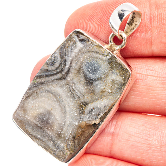 Sterling silver pendant with rectangular druzy stone, speckled gray and gold.