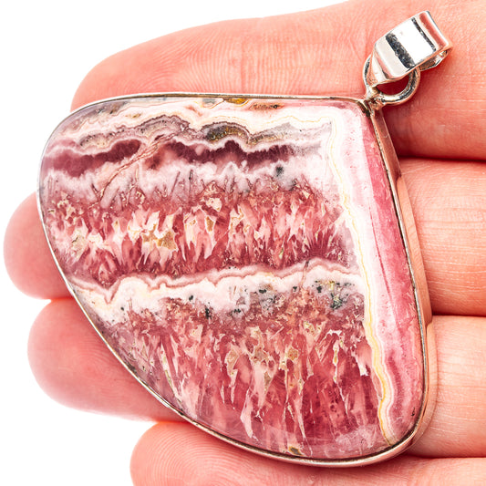 Rhodochrosite teardrop pendant in .925 sterling silver with silver bail