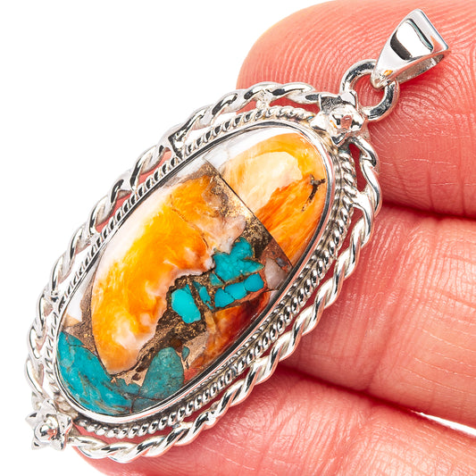 Oval spiny oyster turquoise pendant in .925 sterling silver, orange and teal stone