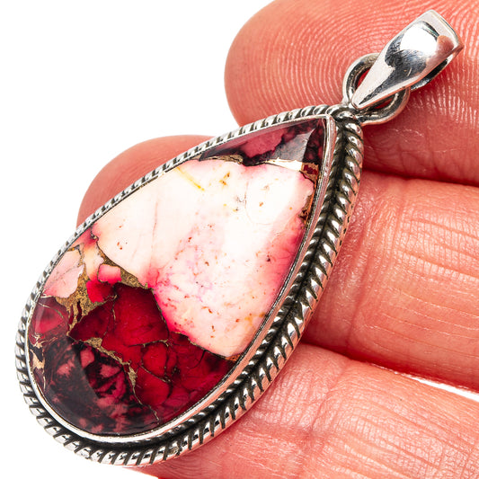 Sterling silver teardrop pendant with red and white marbled stone cabochon.