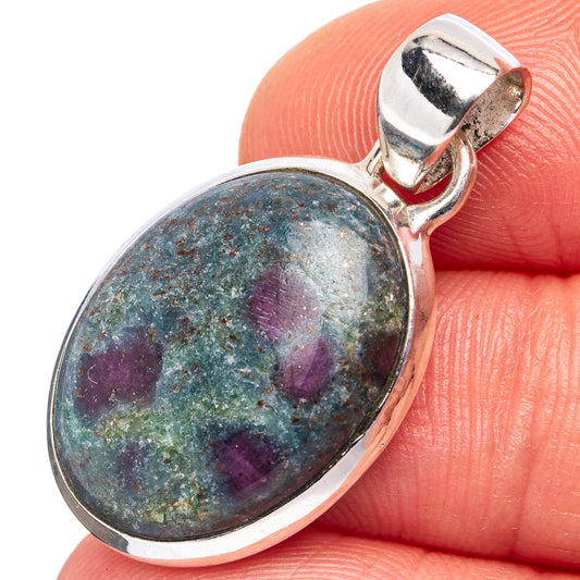 Sterling silver oval pendant with blue-green kyanite stone and purple speckles