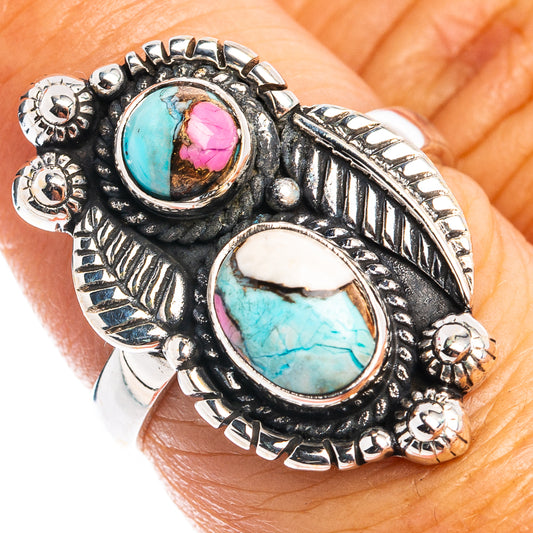 Sterling silver turquoise ring with two oval inlays, pink accents, engraved details