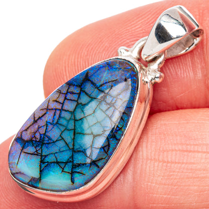 Sterling silver opal pendant with iridescent blue crackle cabochon detail
