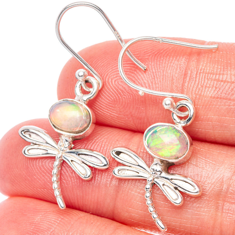 925 sterling silver dragonfly earrings with oval opal-like stones and dangling wings
