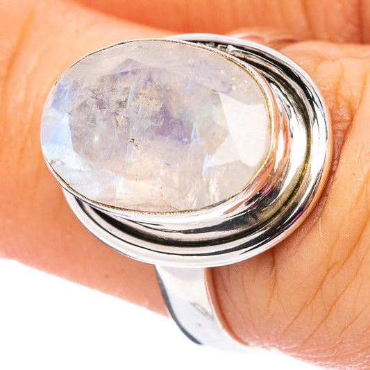 Oval faceted rainbow moonstone ring, polished .925 sterling silver, close-up top view