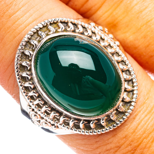 Oval green onyx ring with ornate .925 sterling silver bezel setting
