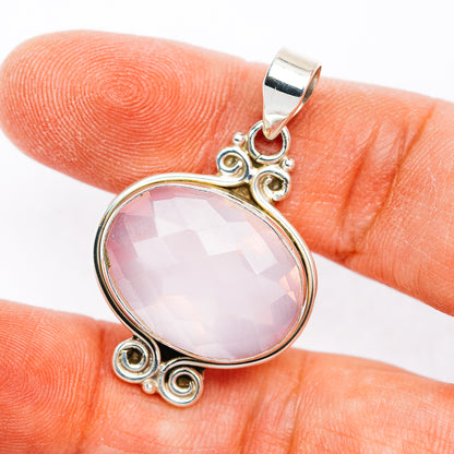 Rose quartz pendant with oval pink gemstone and .925 sterling silver ornate setting