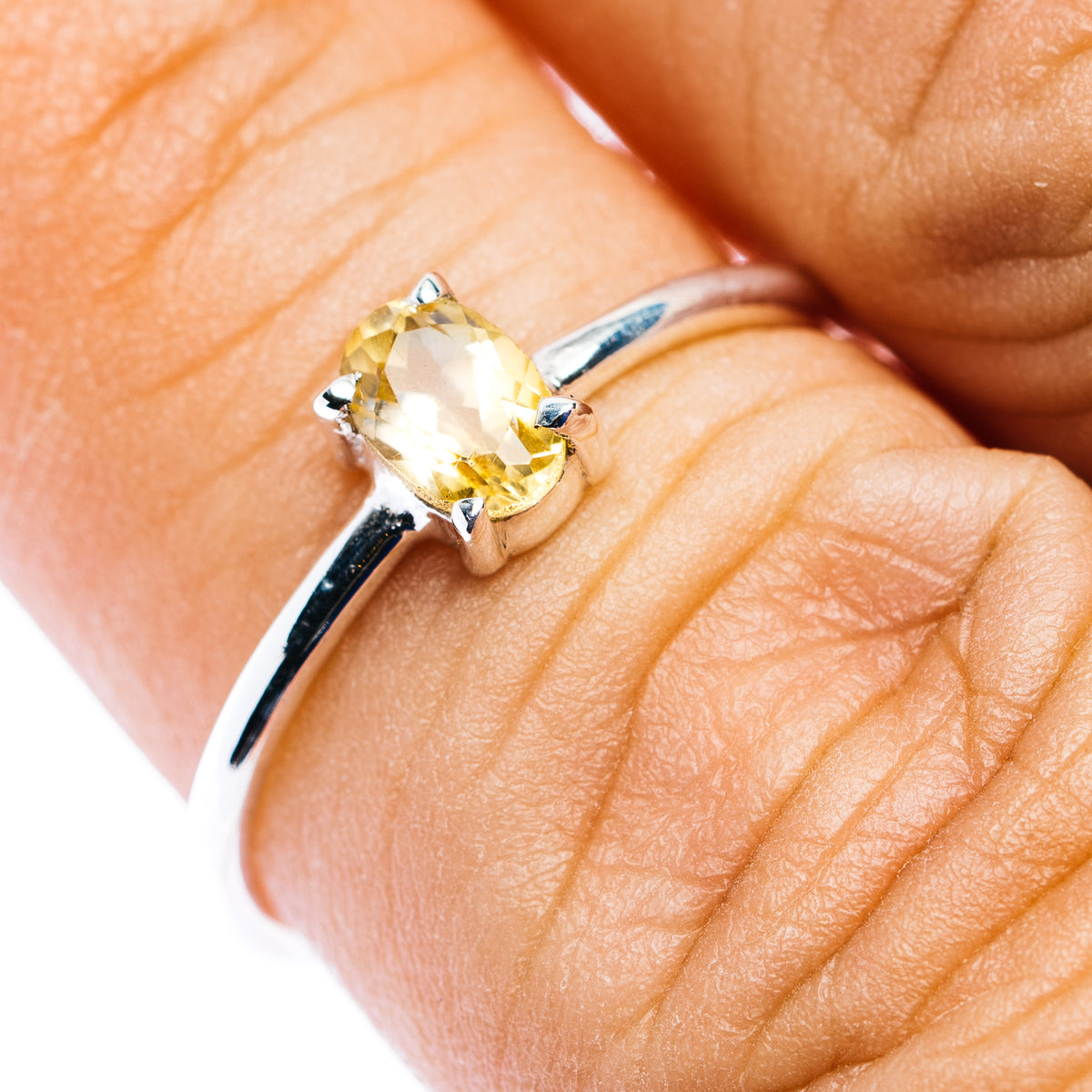Stackable sterling silver ring with oval citrine gemstone and prong setting