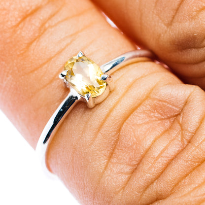 Stackable sterling silver ring with oval citrine gemstone and prong setting