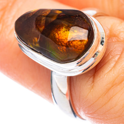 Sterling silver oval fire agate ring with dark brown cabochon and orange fire flashes