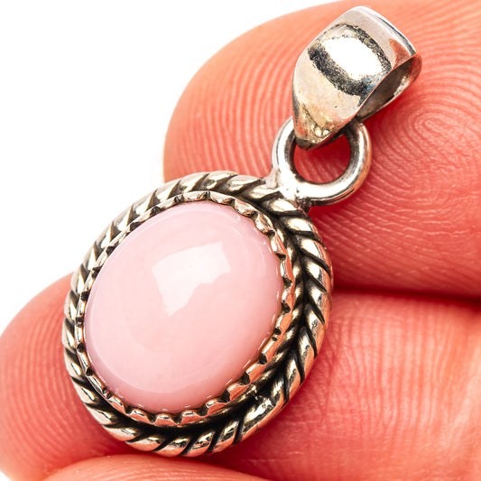 Pink opal pendant with oval cabochon, twisted rope sterling silver bezel and loop