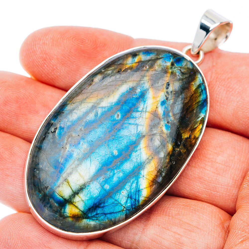 925 sterling silver oval Spectrolite pendant, blue/gold flash cabochon