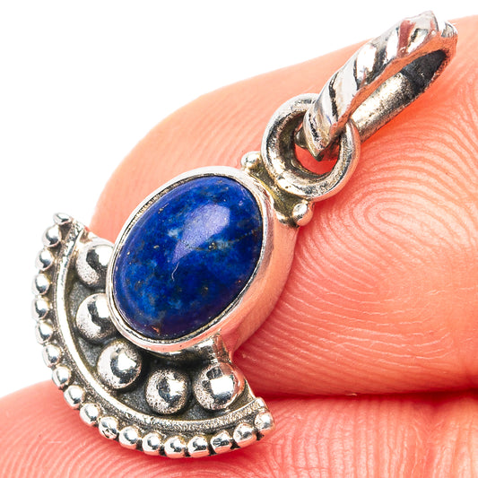 Sterling silver lapis lazuli oval pendant with ornate beaded bezel and bail