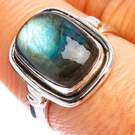 Labradorite oval ring in .925 sterling silver, teal-blue iridescent stone bezel