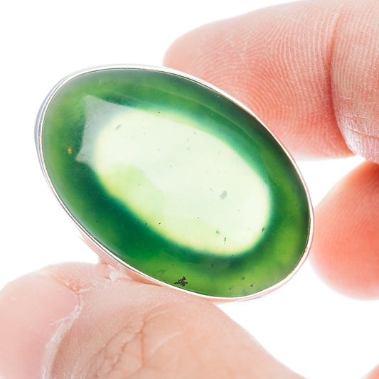 Nephrite jade ring with oval green cabochon, .925 sterling silver band