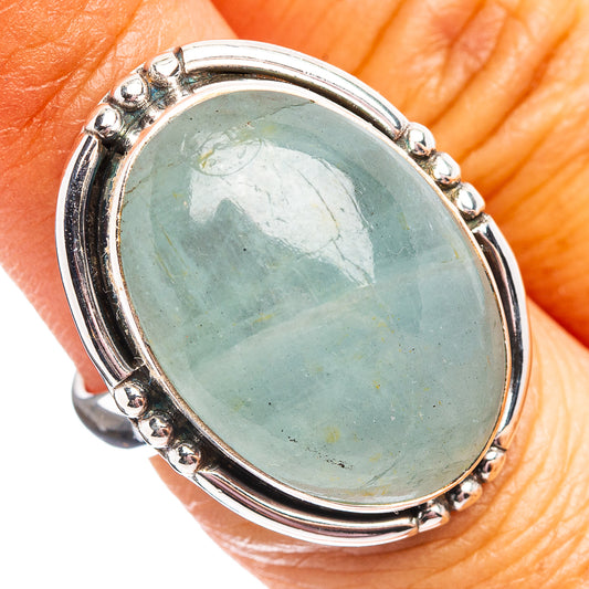 Aquamarine oval gemstone ring in .925 sterling silver, oval bezel with small bead accents