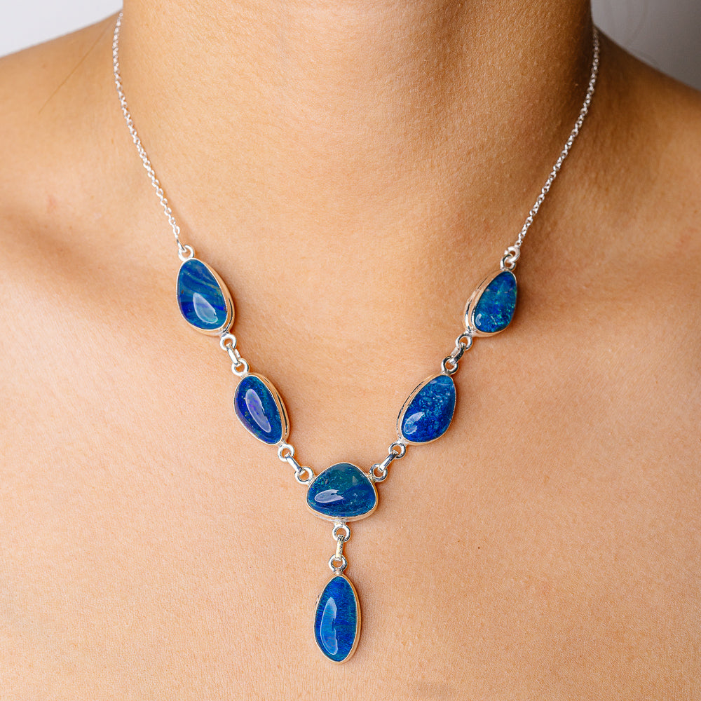 Sterling silver necklace with blue oval opal stones and linked chain
