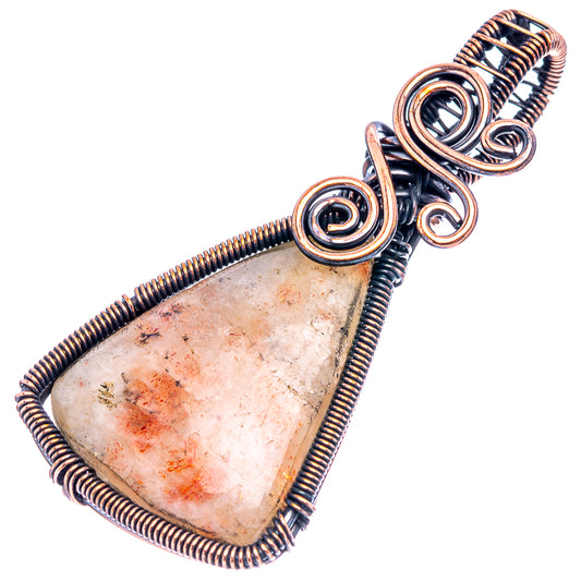 Oxidized copper wire-wrap pendant, triangular stone cabochon with red-brown speckles.