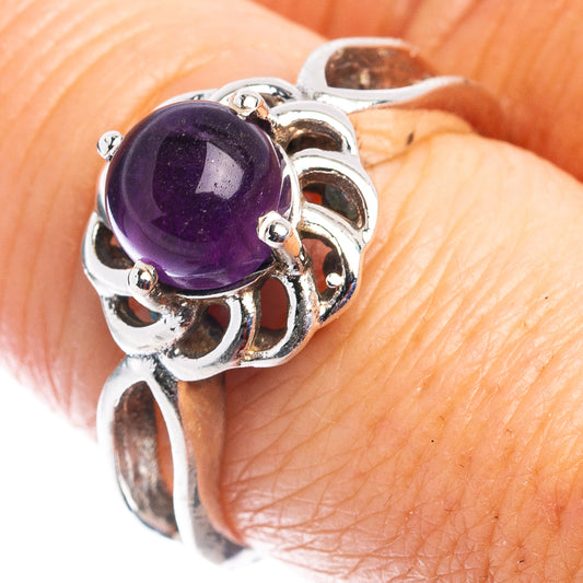 Amethyst sterling silver ring with round purple gemstone and ornate metal setting