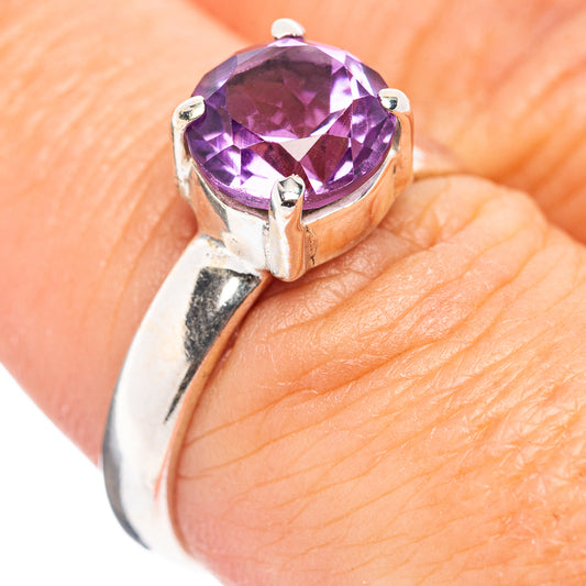 Amethyst gemstone sterling silver ring with oval purple stone, four-prong setting