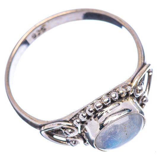 Sterling silver ring with oval moonstone and decorative cutout band, size 5.5