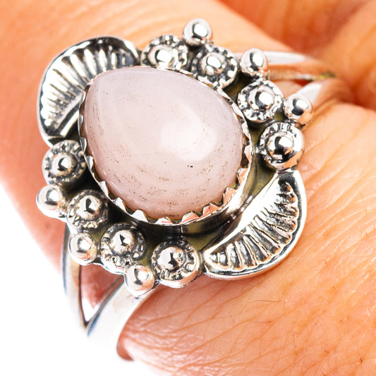 Oval pink opal-style gemstone ring with silver beaded native-style setting, size 8.75